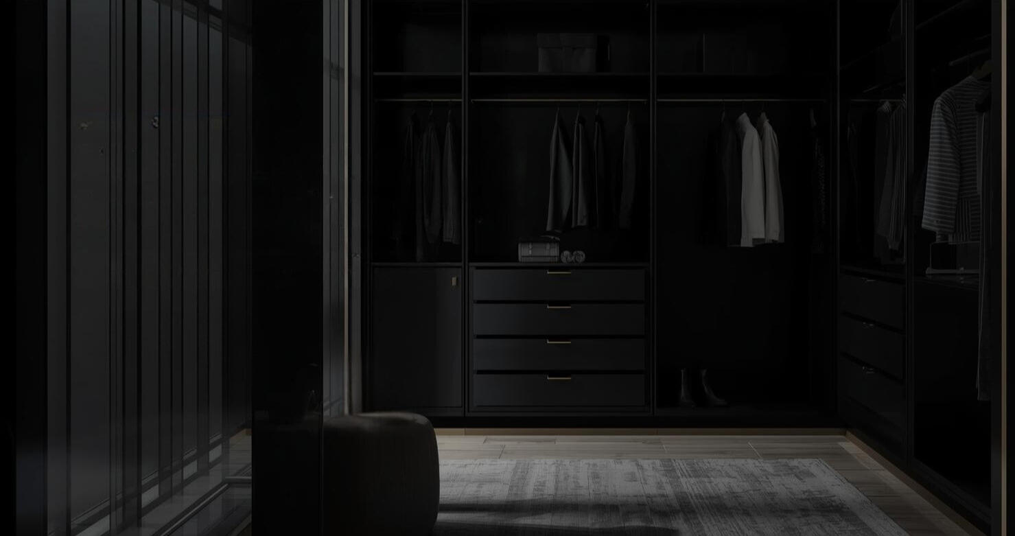ModestFind Closet Concierge - Denver, CO Luxury walk-in closet with dark cabinetry and gold accents — ModestFind wardrobe concierge Denver, Colorado
